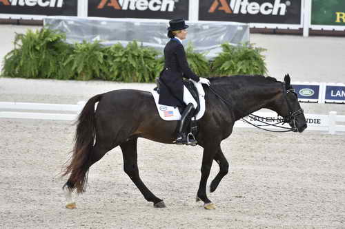 WEG-Dressage-8-25-14-GPTeam-0004013-TinaKonyot-CalectoV-USA-DDeRosaPhoto