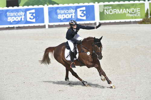 WEG-EventingSJ-8-31-14-0002884-SandraAuffarth-OpgunLouvo-GER-DDeRosaPhoto