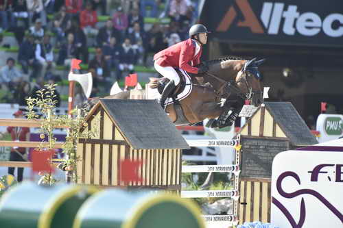 WEG1-SJ-Team1-9-3-14-0008509-KentFarrington-Voyeur-USA-DDeRosaPhoto