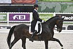 WEG-Dressage-8-25-14-GPTeam-0006026-AdrienneLyle-Wizard-USA-DDeRosaPhoto