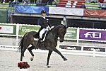 WEG-Dressage-8-25-14-GPTeam-0006066-AdrienneLyle-Wizard-USA-DDeRosaPhoto