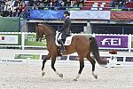 WEG1-Dressage-8-26-14-GPTeam-0007784-LauraGraves-Verdades-USA-DDeRosaPhoto