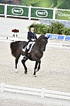 WEG-Dressage-8-25-14-GPTeam-0003906-TinaKonyot-CalectoV-USA-DDeRosaPhoto